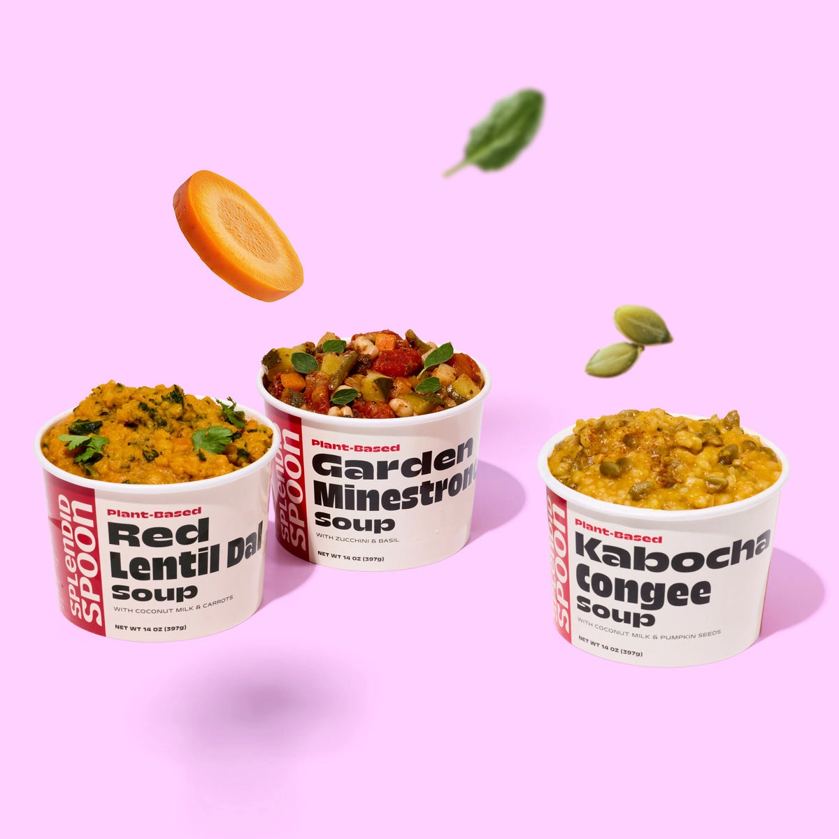 Cups of Splendid Spoon soup floating on a pink background
